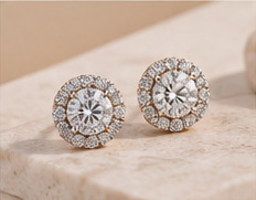 Illustrative pair of halo stud earrings
